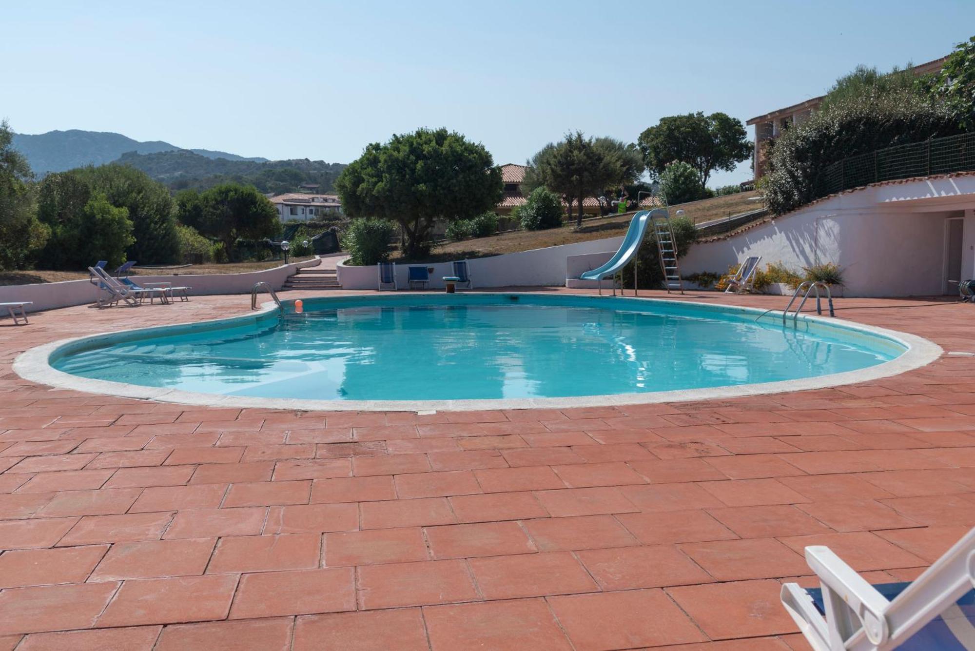 Appartamento Trilocale Vista Piscina Baja Sardinia Exterior foto